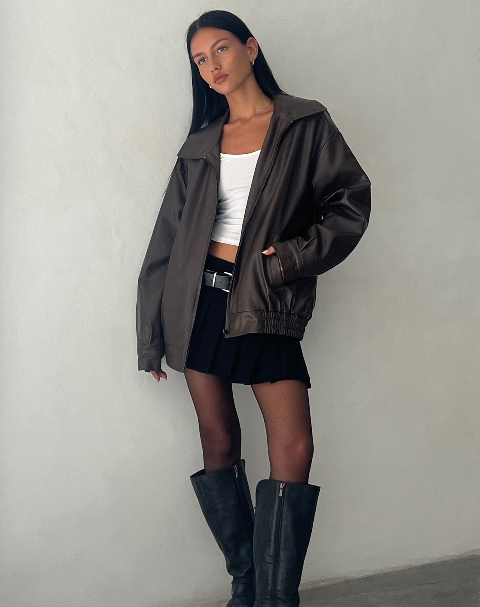 Oversized brown PU leather jacket with wide collar and elasticated hem designed for women by Sophia and Grace London in bitter chocolate tone
