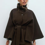 High-neck wool blend cape coat for women with belted waist, available in camel, ivory, navy and espresso brown